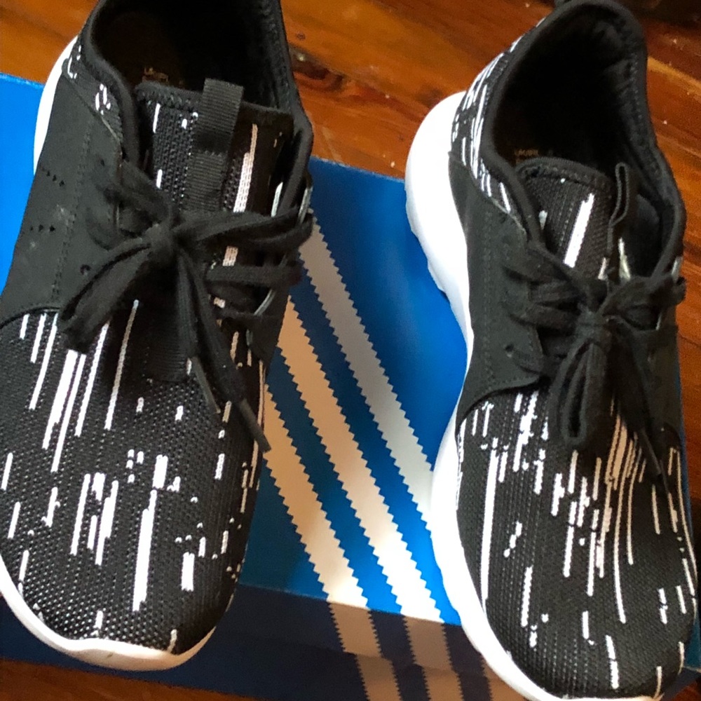 Men’s designer sneakers size 8.